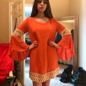 Super cute flattering detailed dress.